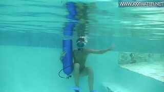 Hungarian pornstar Minnie Manga likes riding toy underwater