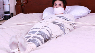 Tabatha Douglas is a Triple Panty Gagged, Heavily Roped up, then Mummified & Bound to the Bed By a Fugitive on The Run