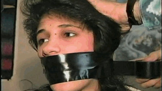19 Yr OLD LATINA IS MOUTH STUFFED, WRAP GAGGED, GAG TALKING, TIED ON BED WEARING GARTER BELT AND STOCKINGS