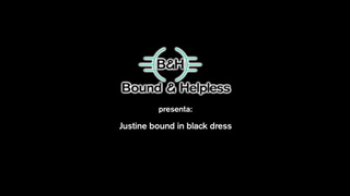 Justine bound in black dress