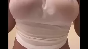light skin youngster in wet white shirt playing with her gigantic tits