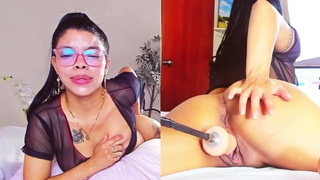 Fine african bitch with glasses on looks very sweet while being sexed by a machine