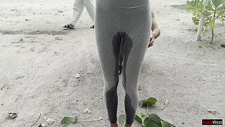 Crazy lady wetting her leggings in public