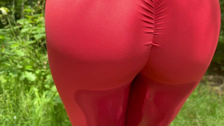 A sweety in leggings pees in nature