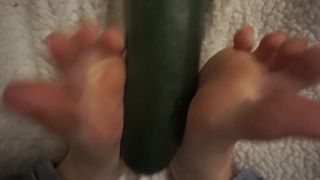 simulating footjob with an gigantic zucchini by a virgin sweet bitch