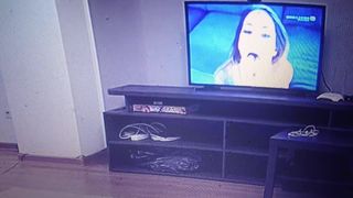 Young girl gives boyfriend a blowjob and porn movie on tv...