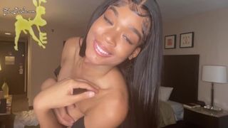 ATTRACTIVE AFRICAN TRANNY SHOWS OFF HER BOOBIES