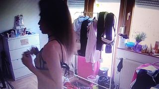 Young girl switches to lingerie (Voyeur Spy)