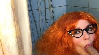 Red-Haired Beauty Sucks Cock In The Bathroom