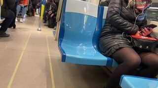 Teenie upskirt in ebony pantyhose waiting subway