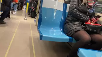 Teenie upskirt in ebony pantyhose waiting subway
